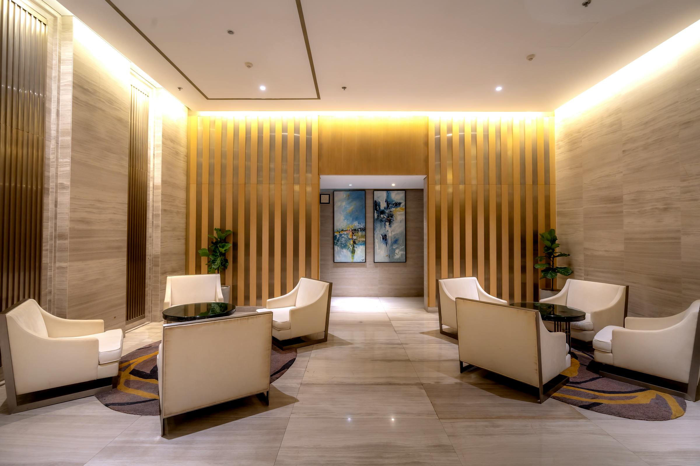 A private lounge in soft light, where a VIAIVE journey is planned before it is secured.